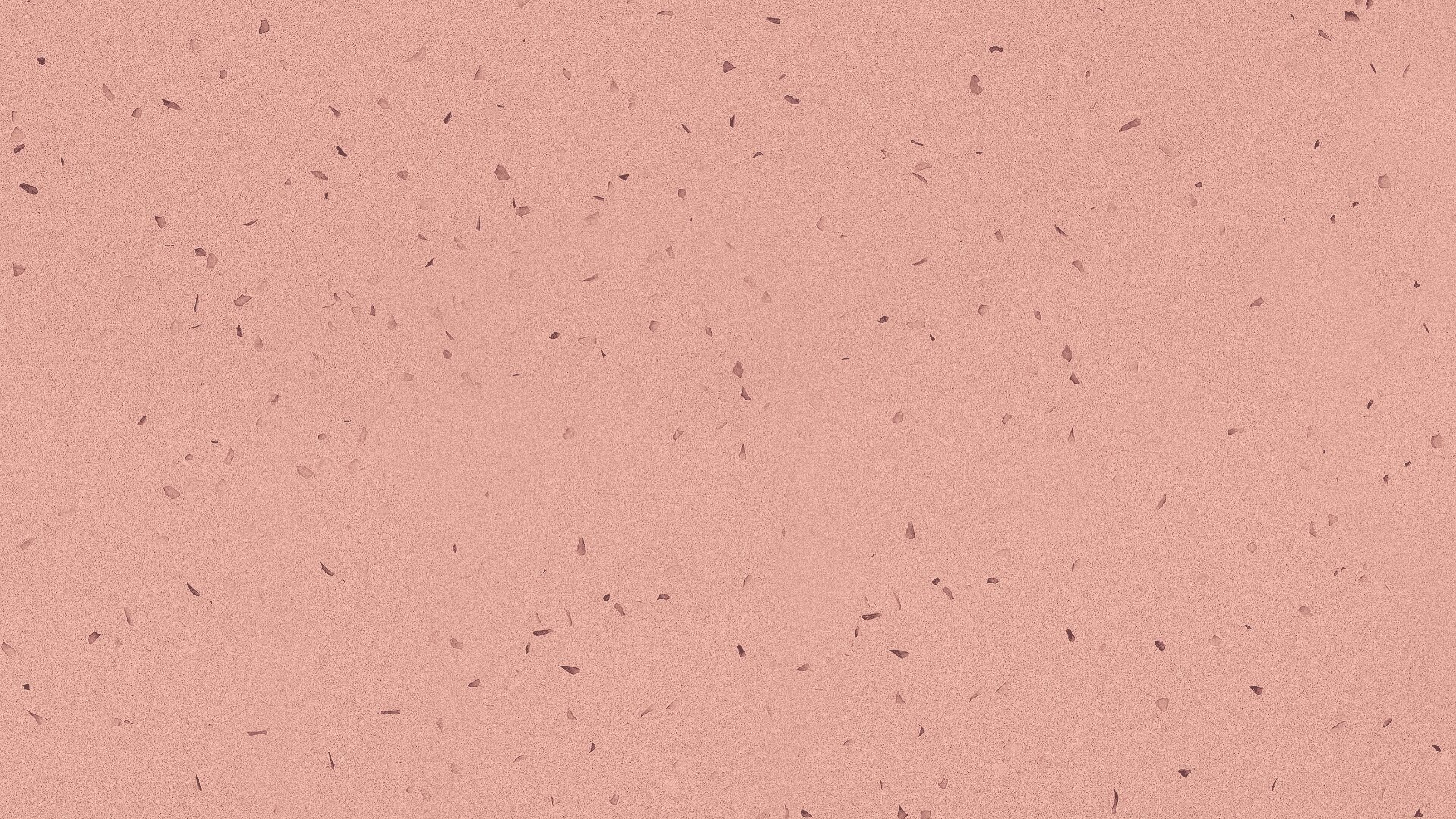 Nahaufnahme einer strukturierten rosafarbenen Oberfläche, die mit verstreuten kleinen dunklen Flecken und unregelmäßigen Punkten übersät ist. Der Hintergrund ist gleichmäßig rosa mit subtilen Tonabweichungen.