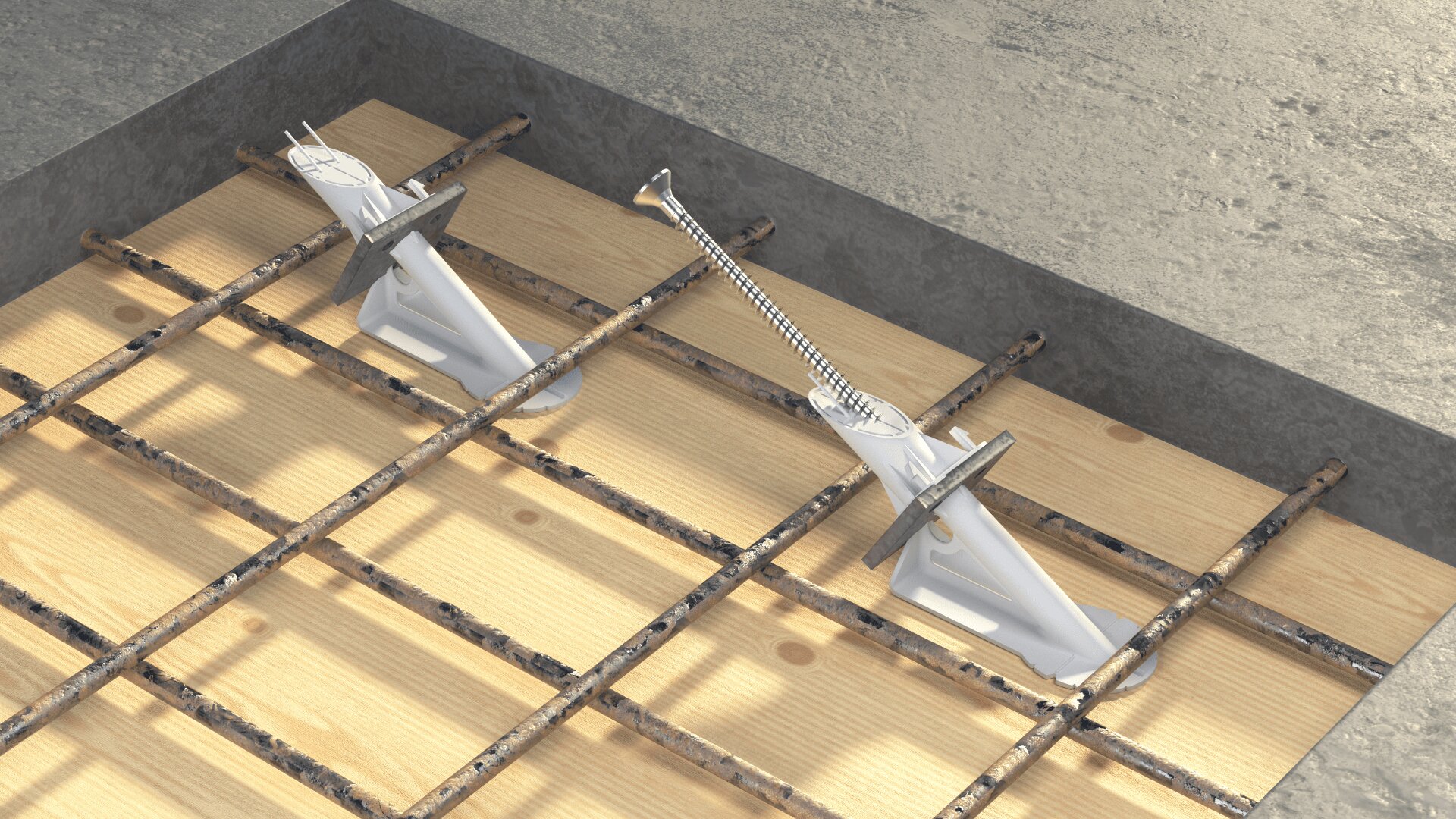 Holzschalung mit Metallgitter und zwei weißen Kunststoffabstandshaltern für die Betonbewehrung, die auf eine Baustelle gestellt wird.
