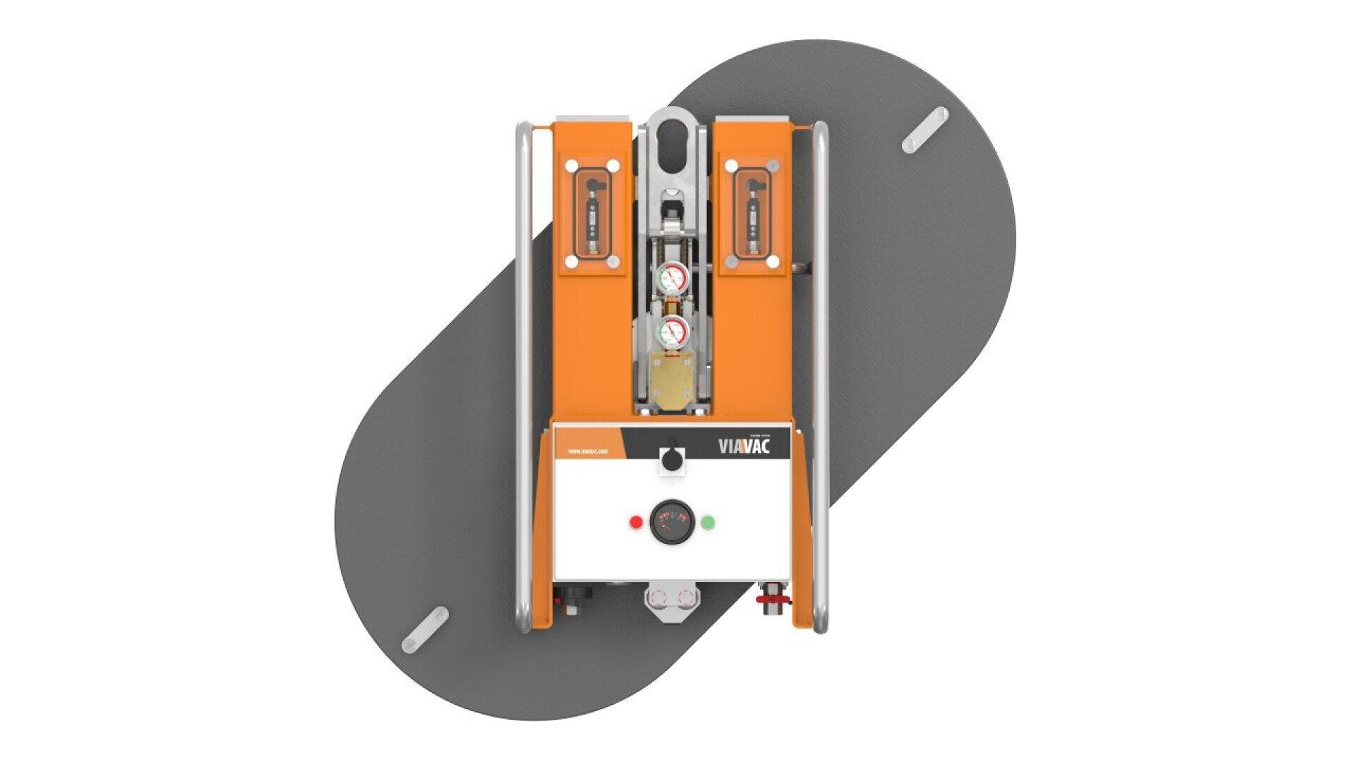 Vue de haut d'un appareil industriel orange et blanc avec des boutons, des leviers et des indicateurs, monté sur une plate-forme grise et oblongue. L'appareil est étiqueté VIVAAK.